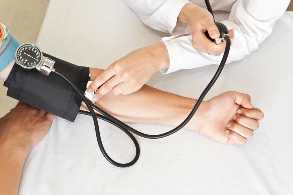 doctor conducting work physical exam new york urgent care